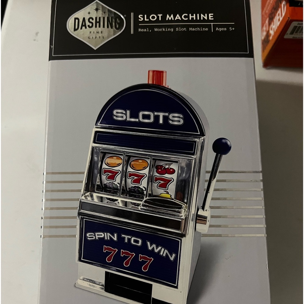 Brand New in Box Dashing Coin Machine  Bank Flashing lights